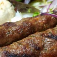 Kafta Kabob Plate · Flame broiled of ground beef and lamb. Seasoned with onion, parsley, spices and served with ...