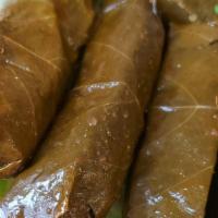 Grape Leaves Plate (5 Pieces) · Grape leaves filled with rice, finely diced tomatoes, parsley, and lemon juice.