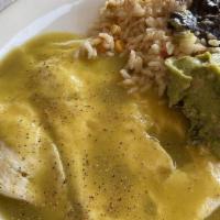 Chilaquiles · Eggs scrambled with corn tortilla chips, salsa verde sauce topped with guacamole, sour cream...