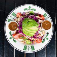 Mustard Seed Chopped Salad · Chopped romaine lettuce, turkey bacon, avocado, grilled chicken, diced tomatoes, fresh basil...