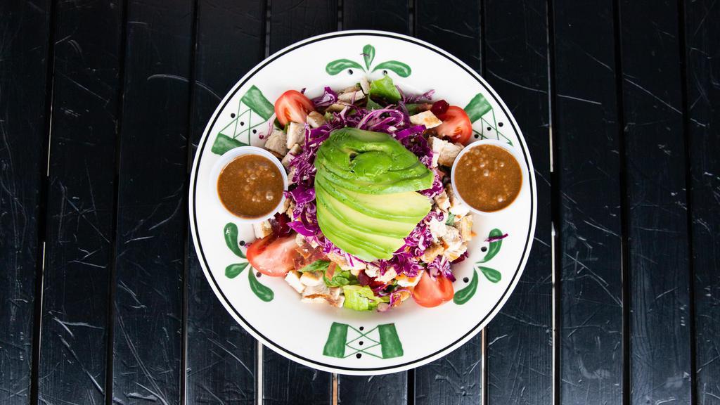 Mustard Seed Chopped Salad · Chopped romaine lettuce, turkey bacon, avocado, grilled chicken, diced tomatoes, fresh basil, beets, garbanzo beans, & gorgonzola cheese. Served with Dijon vinaigrette dressing or balsamic vinaigrette dressing.