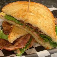 Classic Blt · Toasted sourdough with mayo, bacon, lettuce, and tomato.