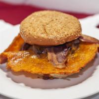 Western Bbq Squeeze Burger · Grilled 1/3 lb. patty topped with melted cheddar cheese, bacon, barbeque sauce, onion rings,...