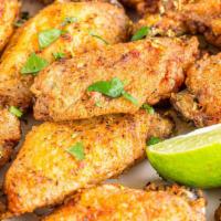 Traditional Lemon Pepper Wings · Delicious traditional crispy wings tossed with lemon pepper with carrots and celery.
