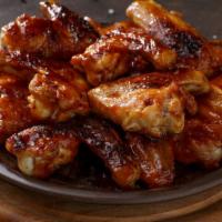 Smokey Bbq Boneless Wings · Delicious boneless crispy wings tossed in BBQ sauce with carrots and celery.