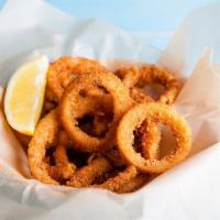 Onion Rings · Hand-cut onions battered and deep-fried till golden brown.