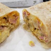 Ham Burrito · Ham and eggs served with potatoes, cheddar cheese, and cream.
