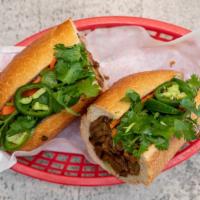 Vietnamese Sandwich · Served with cucumber, carrot, cilantro, jalapeños, and mayonnaise