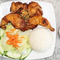 Roasted Cornish Hen Over Rice · Served with roasted whole hen served with steamed rice and salad.