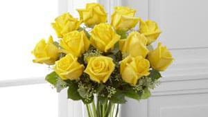 The Ftd Yellow Rose Bouquet · The FTD yellow rose bouquet.