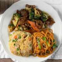 Beef With Broccoli · Tender slice beef with broccoli, carrots and onion stir fried in brown sauce.