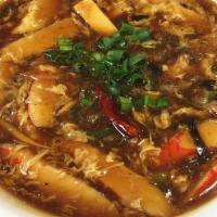 Hot & Sour Soup · Seafood, shrimp, imitation crab, egg, bamboo shoot, tofu and dried mushroom in house broth.