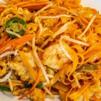 Phad Thai Spicy Noodle · Thin thai rice noodle with egg, beans sprouts, green onion, chicken and shrimp wok stir frie...