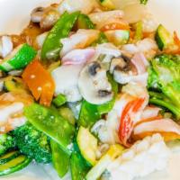 Seafood Delight · A combination of crab shrimp, fish, broccoli, zucchini mushroom, snow peas, carrots, Napa, c...