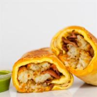 Bacon, Egg & Cheese Breakfast Burrito · Scrambled eggs, melted Cheddar cheese, smokey bacon and crispy potato tots wrapped in a toas...