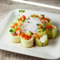 Miso Qt · Our signature cucumber roll. Spicy tuna,4 variety of fish crab salad, avocado, nori, micro m...