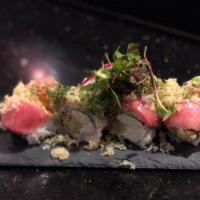 Blossom Roll · Tuna, crab salad, shrimp tempura, avocado, garlic creme, sriracha, unagi sauce, tempura flak...