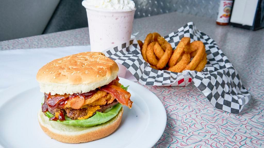 Western Quarter Pound Bbq Bacon Burger · Bacon, bbq sauce, lettuce, tomato, onion rings, mayo, pickle