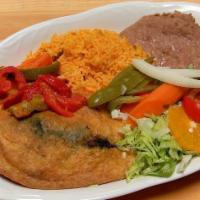 Chile Relleno · Chile Pasilla stuffed with cheese and breaded with a fluffy egg batter. Sides not included.