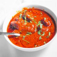 Chicken Tikka Masala Curry · Tender chicken pieces cooked in the tandoor and then tossed in a rich tomato and butter sauce.
