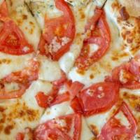 Ricotta Heaven Pizza · Vegan and gluten free options available. Ricotta cheese sauce, fresh tomatoes, Mozzarella ch...