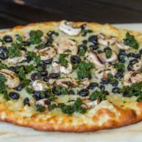 Mushroom Pesto Pizza · Tomato, sauce, vegan cheese, mushroom, black olives.