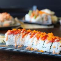 Fire Dragon Roll · Hot and spicy. In: shrimp tempura, snow crab, cucumber. Out: avocado, tuna with special spic...