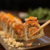 Rock N' Roll · Shrimp, tempura, snow crab, avocado, salmon, macadamia nuts and masago.