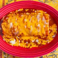 Carnitas Burrito · Filled with carnitas, refried beans, and pico de gallo.