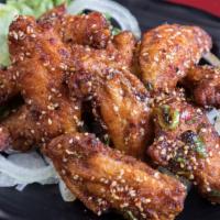 Nagoya Hot Wings Pac · Sweet & spicy chicken wings includes salad rice & furikake rice seasoning.