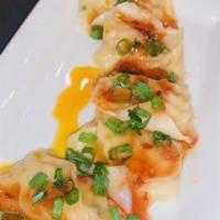 Shrimp Dumplings · Steamed shrimp dumplings in chili oil.