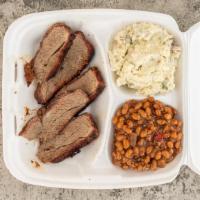 Tri Tip Dinner  · Thin slices of tri tip with two sides and slice of bread.
