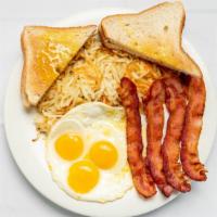 Special #5 · 3 Eggs, 3 Bacon & Sausage or Ham, Hash browns Toast & Jelly.