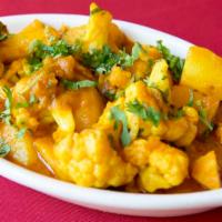 Sagh Aloo · Potato cooked with spinach in curry