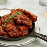 Chicken Wings · sweet and sticky buffalo sauce, ranch dressing