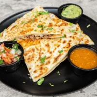 Quesadilla · Toppings: meat, cheese, cilantro, onions, salsa/Green and Red, sour cream