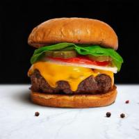 Cheesy For Me Burger · American beef patty topped with melted cheese, buttered lettuce, tomato, onion, and pickles....