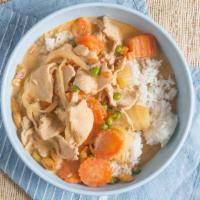 Massaman Curry · Mild curry with potato, carrot, onion, and peanut in coconut sauce.