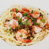 Scampi · Scampi over angel hair. Large shrimp sauteed in garlic butter, lemon juice and spices.