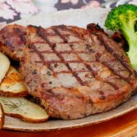 Ribeye Steak · (16oz) Marinated and Aged. Charbroiled to Perfection. Served with side of steamed vegetables...