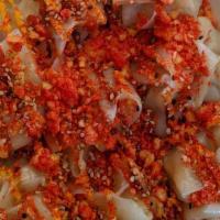 California Buuz/Steamed Dumplings · With Spicy Cheetos on top