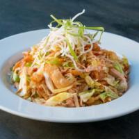 Chinese Chicken Salad · Shredded iceberg lettuce, chicken breast, scallions, carrots, toasted almonds, crispy rice n...