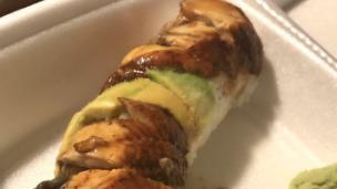 Dragon Roll · In: imitation crabmeat, avocado, cucumber. Out: baked eel, avocado, eel sauce.