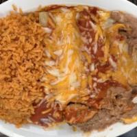 #1. One Enchilada · Served with Rice & Beans.