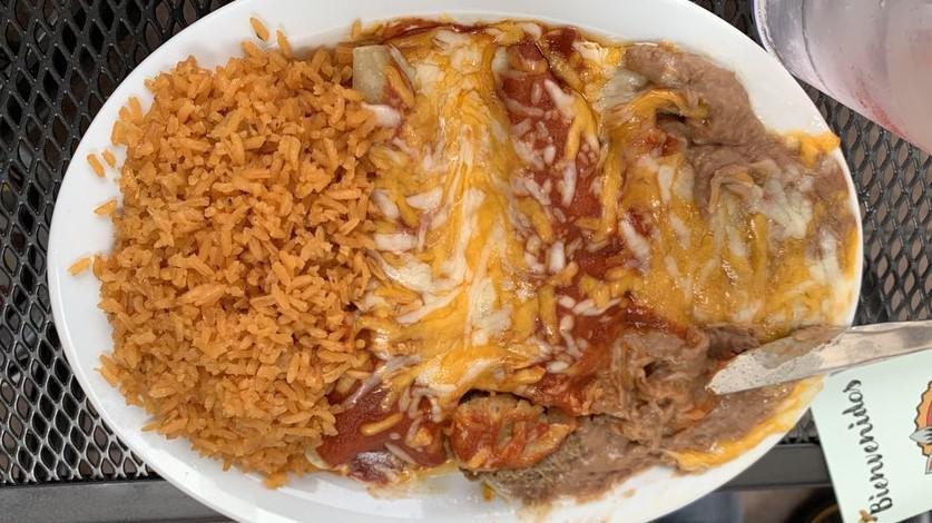 #1. One Enchilada · Served with Rice & Beans.
