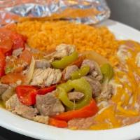 Chile Verde · Green Chile Pork Plate. Served with Rice, Beans & Tortillas.