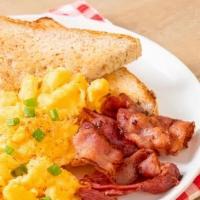 Protein Toast · Texas Toast with 2 eggs and Slices of Bacon.