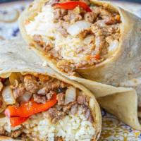 Burrito Charro - Carne · carne asada, fajita mix, and jack cheese. *onion is mixed in with bell peppers