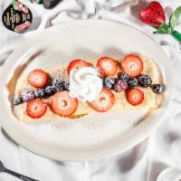 Mixed Berry · 2 crepes with sweet cream cheese topped with mixed berries and whipped cream.