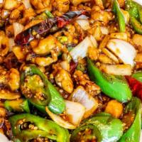 Kung Pao Chicken · Diced chicken with zucchini, celery and carrots stir fried in a spicy kung pao sauce topped ...